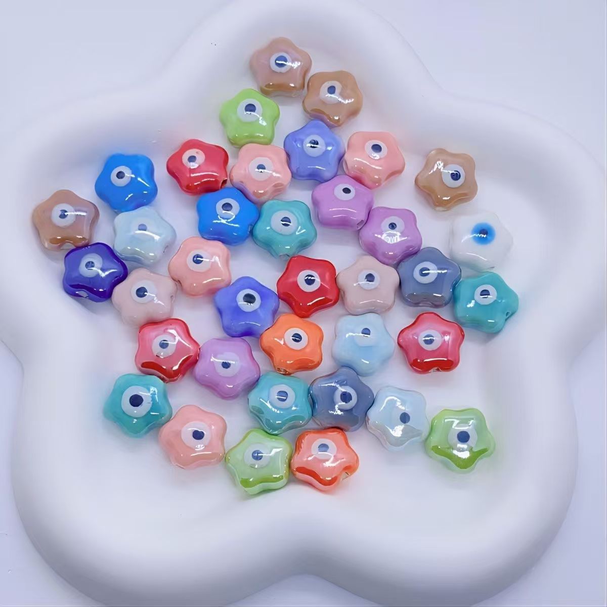 Cerámica de color simple perlada cara de pez cinco pétalos perlas de flores perlas sueltas diy accesorios de decoración de brazalete de cuentas hechas a mano