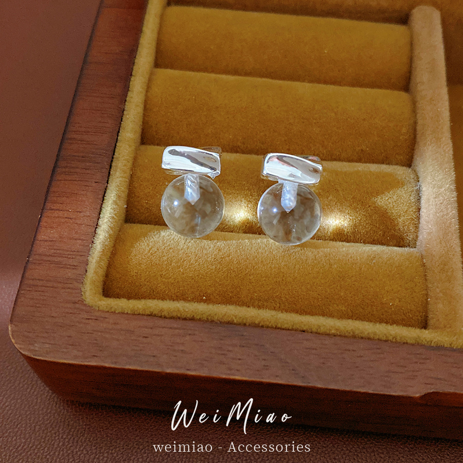 Aguja de plata resina aretes redondos minimalistas estilo diario viaje versátil pendientes ligeros de lujo alta sensación auriculares al por mayor