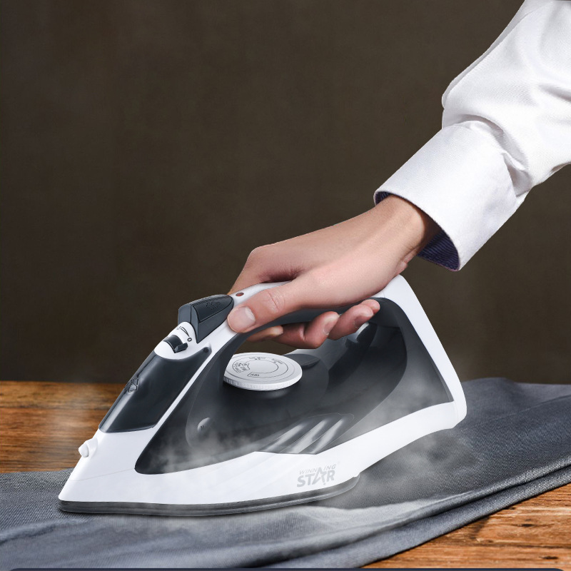 Winningstar transfronteriza dedicada hogar pequeños aparatos eléctricos hierro eléctrico estándar británico estándar europeo de mano colgando máquina de planchar en stock