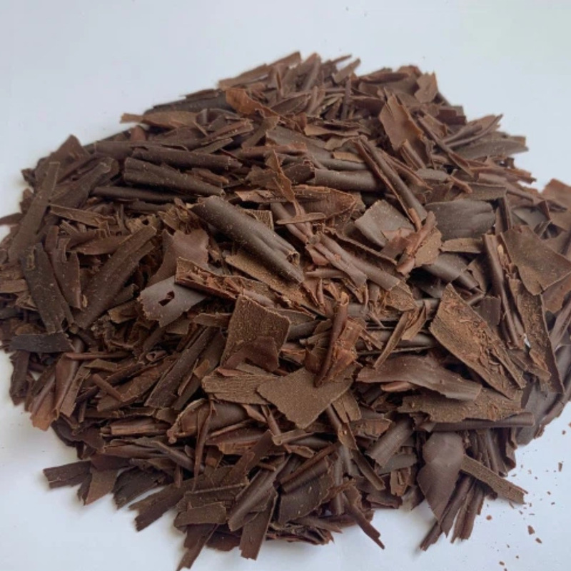 Premium pure dark chocolate shavings, melts in your mouth, for desserts, coffee, and baking. Commercial bulk packaging, in stock, direct from the factory, wholesale