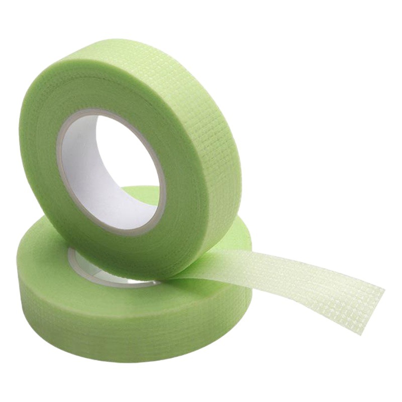 Injerto al por mayor pestañas postizas herramientas auxiliares con agujeros cinta transpirable aislamiento de pestañas cinta no tejida