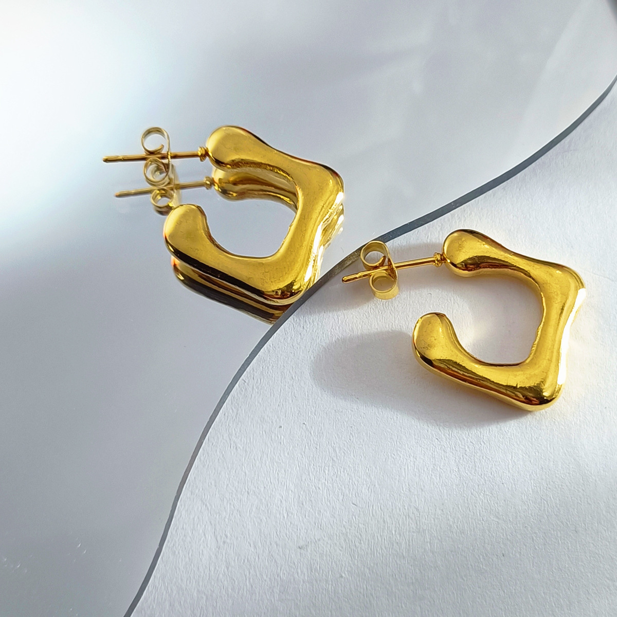 Cross-border best-selling oil-pressure stainless steel hollow earrings from Europe and America, high-end, trendy and light luxury style, 18K earrings wholesale 37 Item Picture