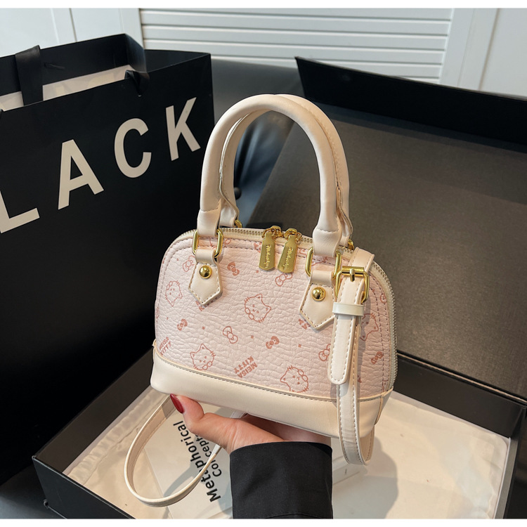 Bolso de mochila para mujeres 2025 textura fresca de alta calidad felina de moda versátil bolso coreano de viaje bolso de hombro