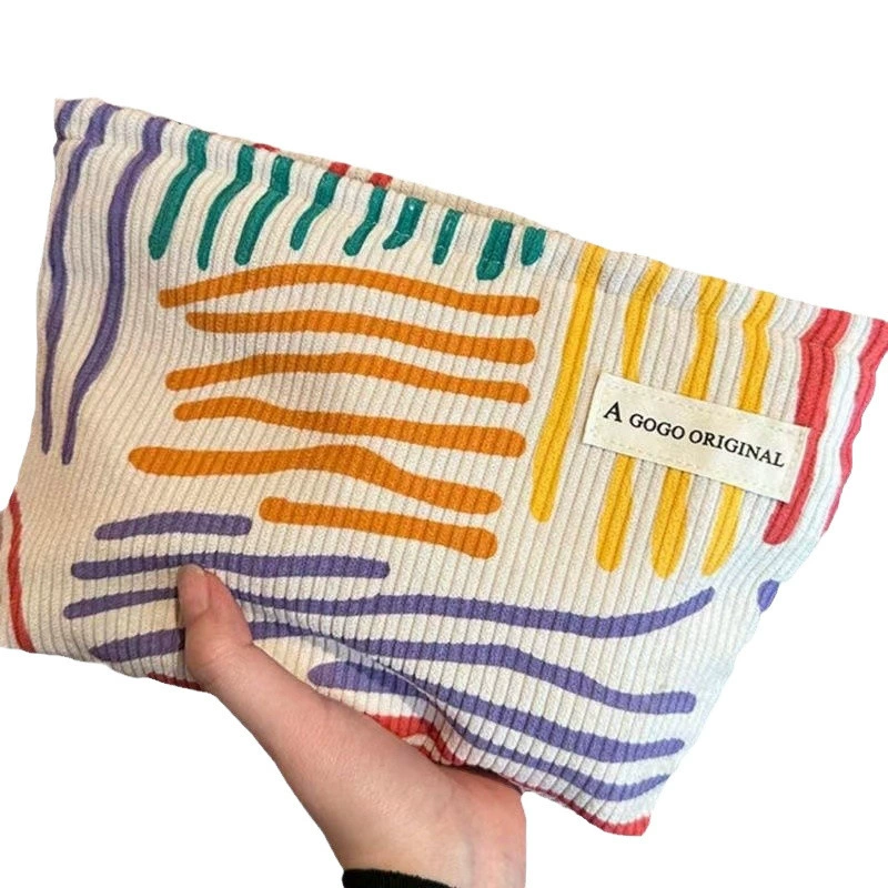 Handheld storage system, cosmetic bag, shopping bag, travel bag