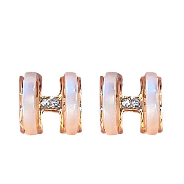 Corea del Sur ins elegante luz de lujo pendientes de estilo frío pendientes de cercanías simples para mujeres Aguja de plata circón letra fritillary pendientes