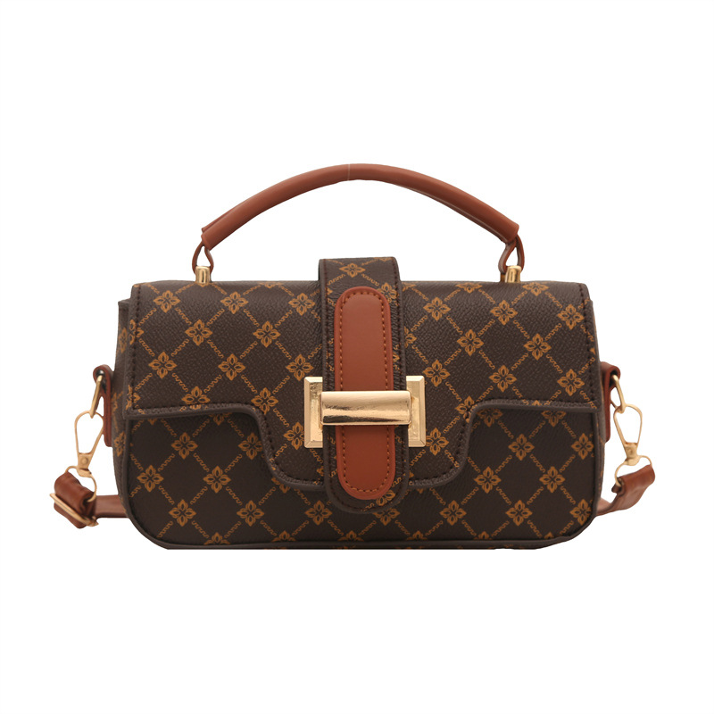 Bagos de color retro retro de estilo extranjero mujeres 2025 nuevo nicho diseño de empalme bolso pequeño bolso portátil de viaje