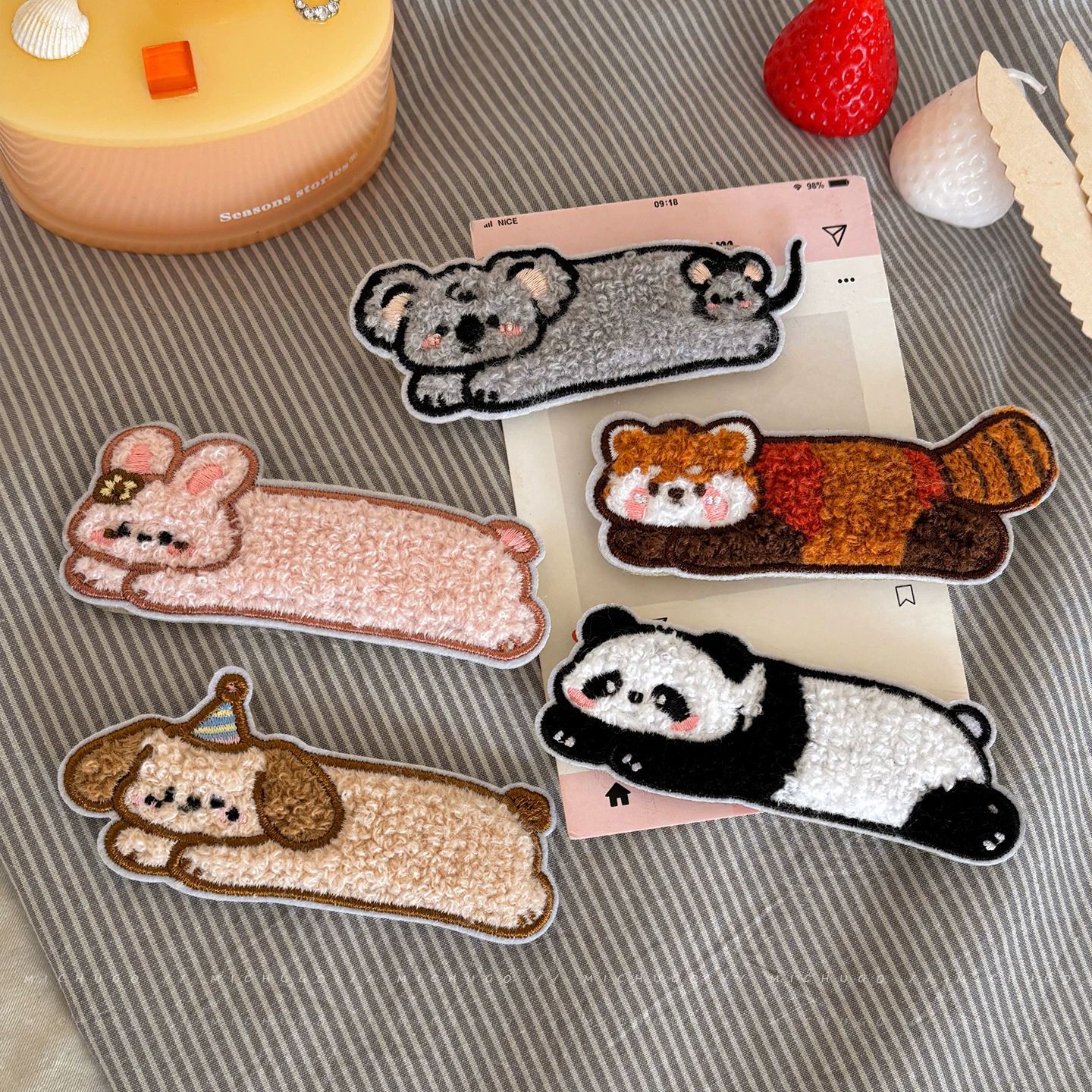 Cute plush raccoon hair clips, perfect for girls, to keep stray hairs in place and create a neat, seamless look for bangs; also available as a small bunny hair accessory