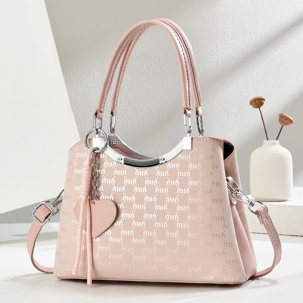 Marca de gran capacidad bolso tote francés nuevo temperamento femenino bolso femenino de moda europea y americana bolso de hombro de viaje de compras de ocio