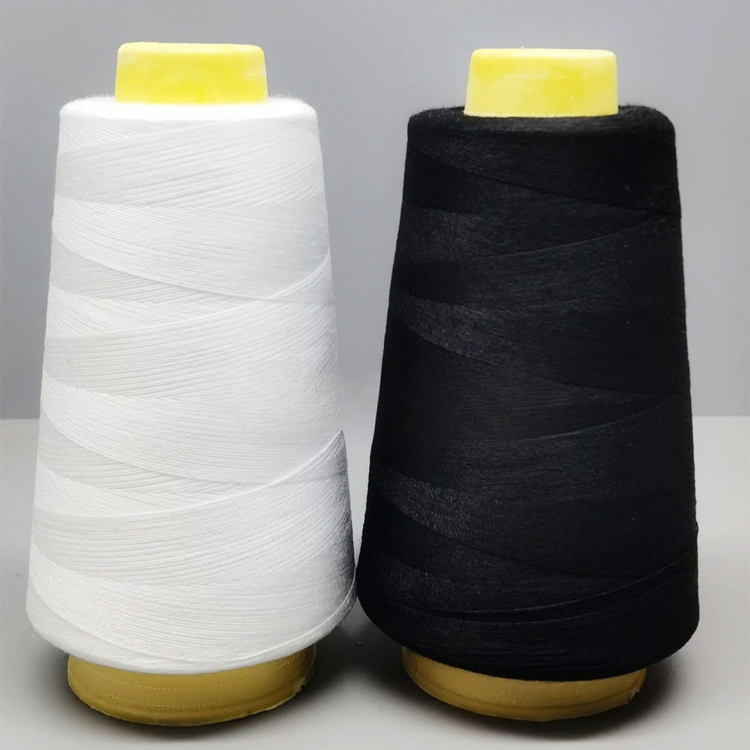 纫机线家用大卷缝衣服宝塔线白黑红色细线家用纫机线平车锁边机线