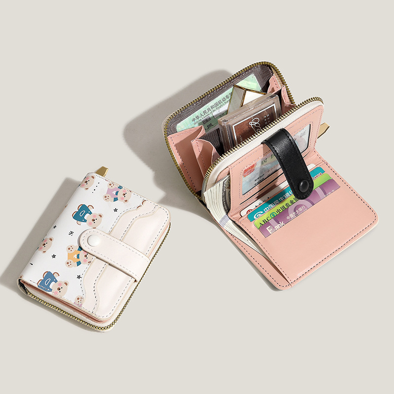 Nuevo tipo de billetera de mujer encantadora impresión de dinosaurio botón corto anti-damagnetismo multi-tarjeta de gran capacidad cartera de alto nivel