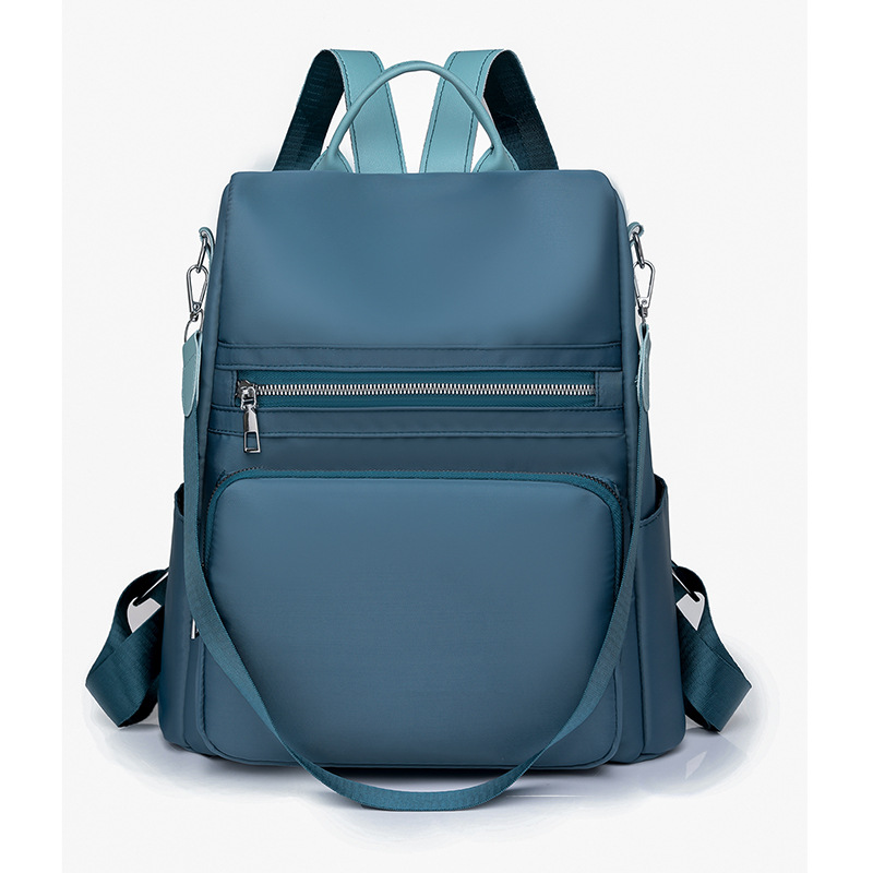 2023 nueva mochila antirrobo de nailon casual para mujer simple y versátil mochila de viaje al aire libre de gran capacidad al por mayor