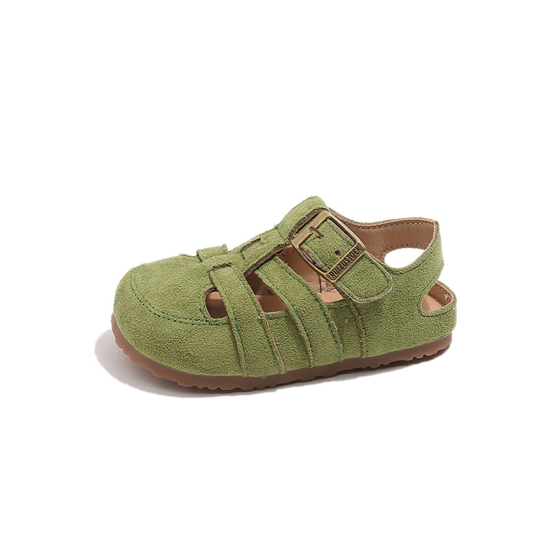 Sandalias romanas huecas para niños 2025 verano nuevo estilo coreano niña plataforma botas de fondo grueso zapatos de playa Baotou para niños