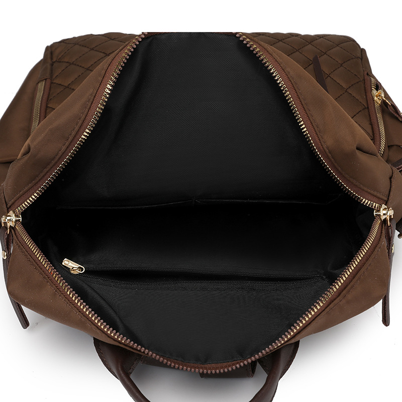 Mochila de nailon para mujer 2025 nueva mochila casual para mujer moda Lingge casual mochila ligera de gran capacidad marea