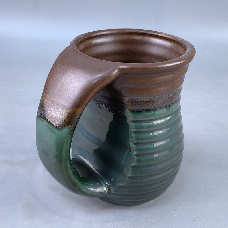 Gran capacidad de cerámica calentadora de mano marca taza de agua creativa horno transfronterizo esmaltado empuje de bolsillo taza de piedra de mano derecha