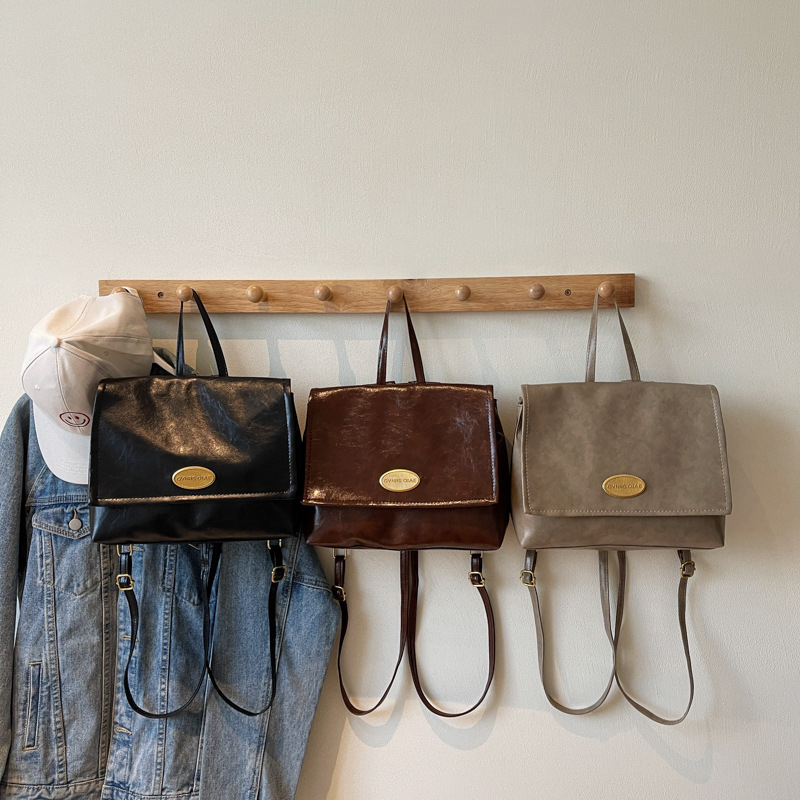 Mochila coreana retro de estilo universitario 2024 invierno nuevo simple de gran capacidad de mano mochila de hombro para viajar