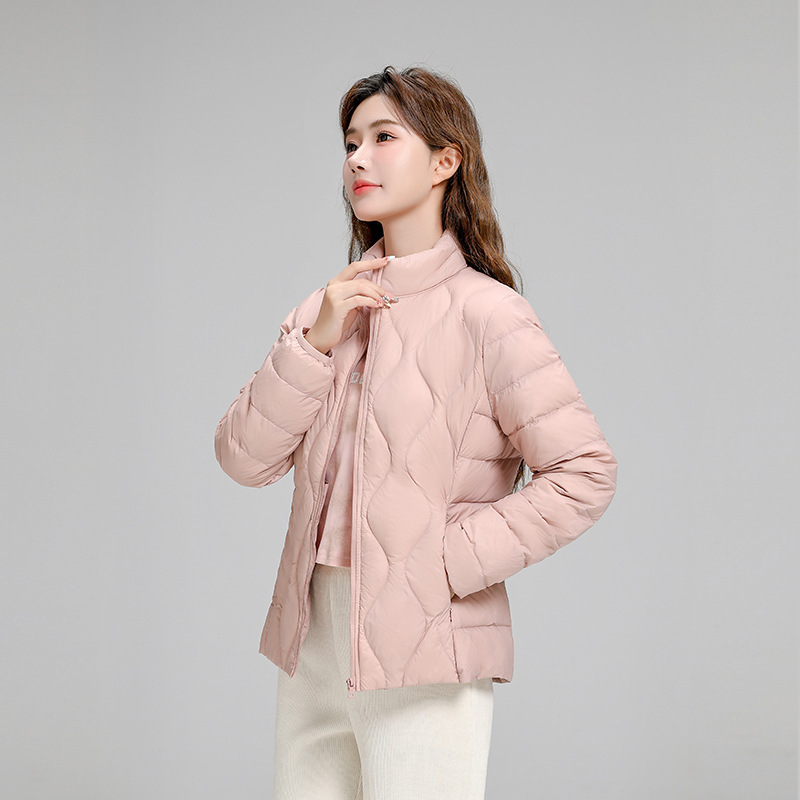 Chaqueta de plumón casual ligera de mujer moda polifacética blanca ligera caliente invierno y otoño abrigo delgado grande