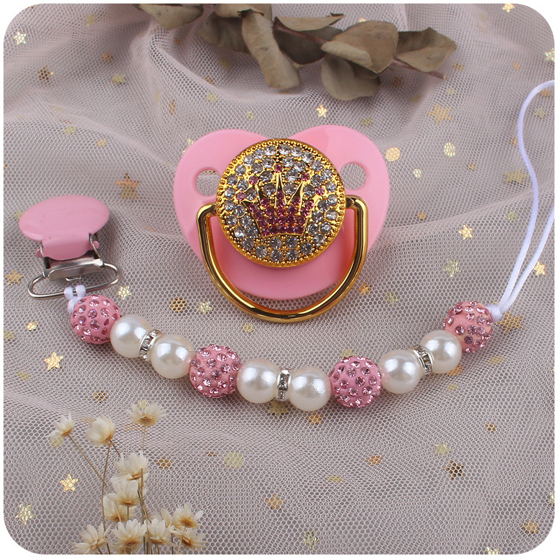 Nuevo bebé suministros corona patrón chupete bebé creativo perla chupete cadena anti-caída traje de cadena