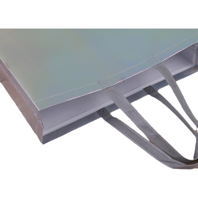 Fabricante spot engrosamiento colorido láser laminada ropa bolso no tejido compras bolsa de regalo de alta gama impresión logotipo