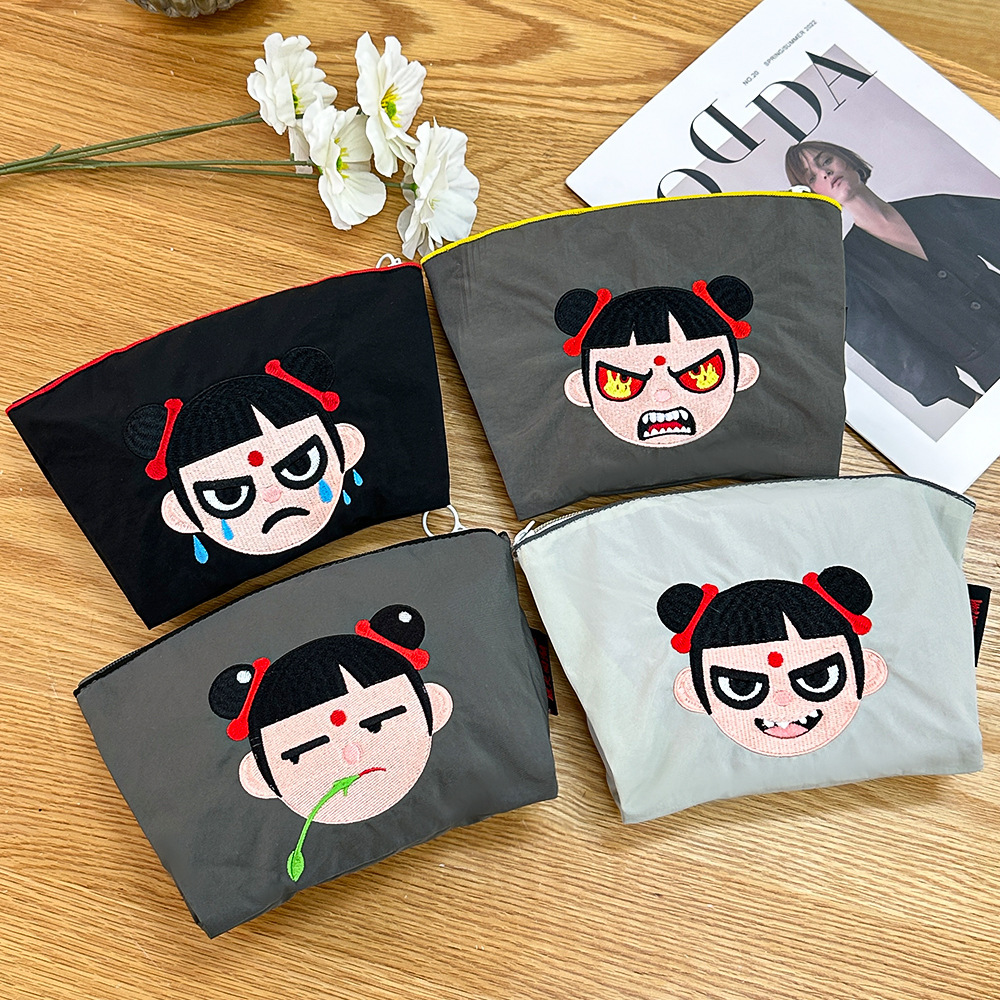 Cartoon cosmetic bag with zipper