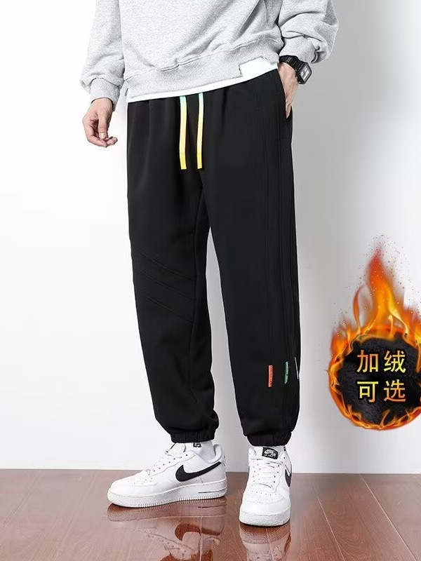 Primavera y otoño 2024 nuevos pantalones casuales para hombres, pantalones deportivos sueltos de la marca de moda juvenil, pantalones deportivos sueltos de color sólido