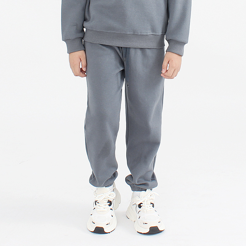 Pantalones de primavera para niños, estilo coreano, nuevos pantalones deportivos largos para niños, pantalones casuales de color sólido para niños grandes, pantalones antimosquitos, pantalones para niños al por mayor