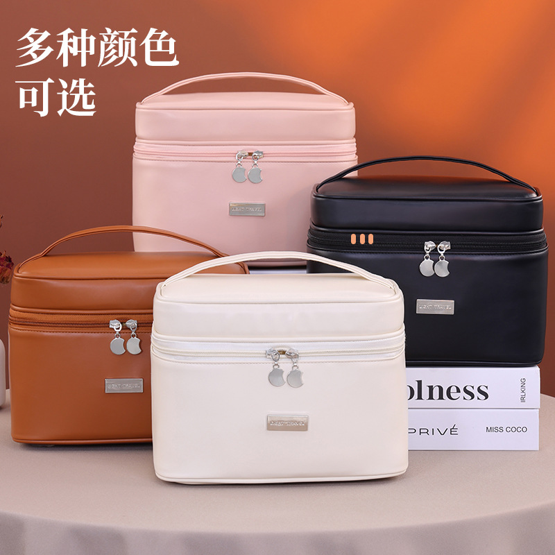 Bolsa de maquillaje de división para mujeres 2025 nuevo paquete de maquillaje de alta gama de gran capacidad bolsa de almacenamiento portátil de viaje bolsa de lavado de mano