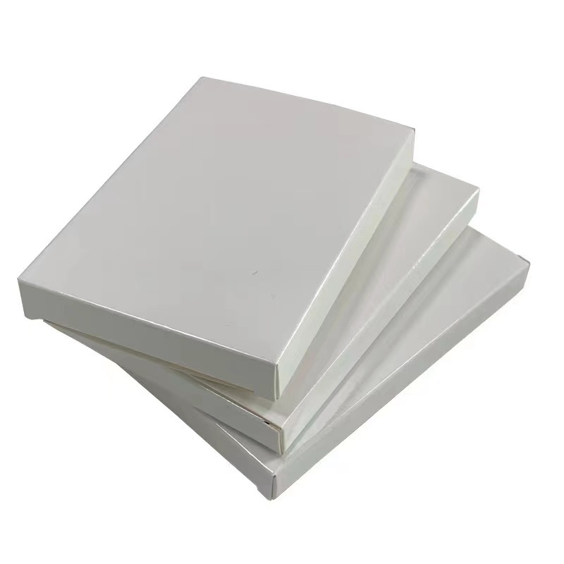 En stock caja blanca rectangular caja de cartón blanco caja de embalaje transfronteriza caja de cartón plegable pegamento ligero caja blanca impresión en color caja de avión
