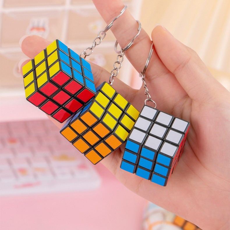 Colgante del cubo de Rubik de tercer orden Descompresión para niños Juguetes educativos Cubo de Rubik Regalo de jardín de infantes Cubo de Rubik de tercer orden especial transfronterizo