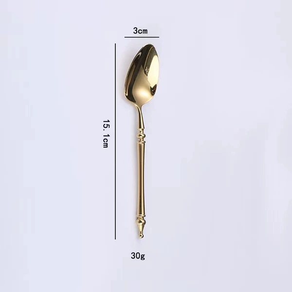 Golden tea spoon