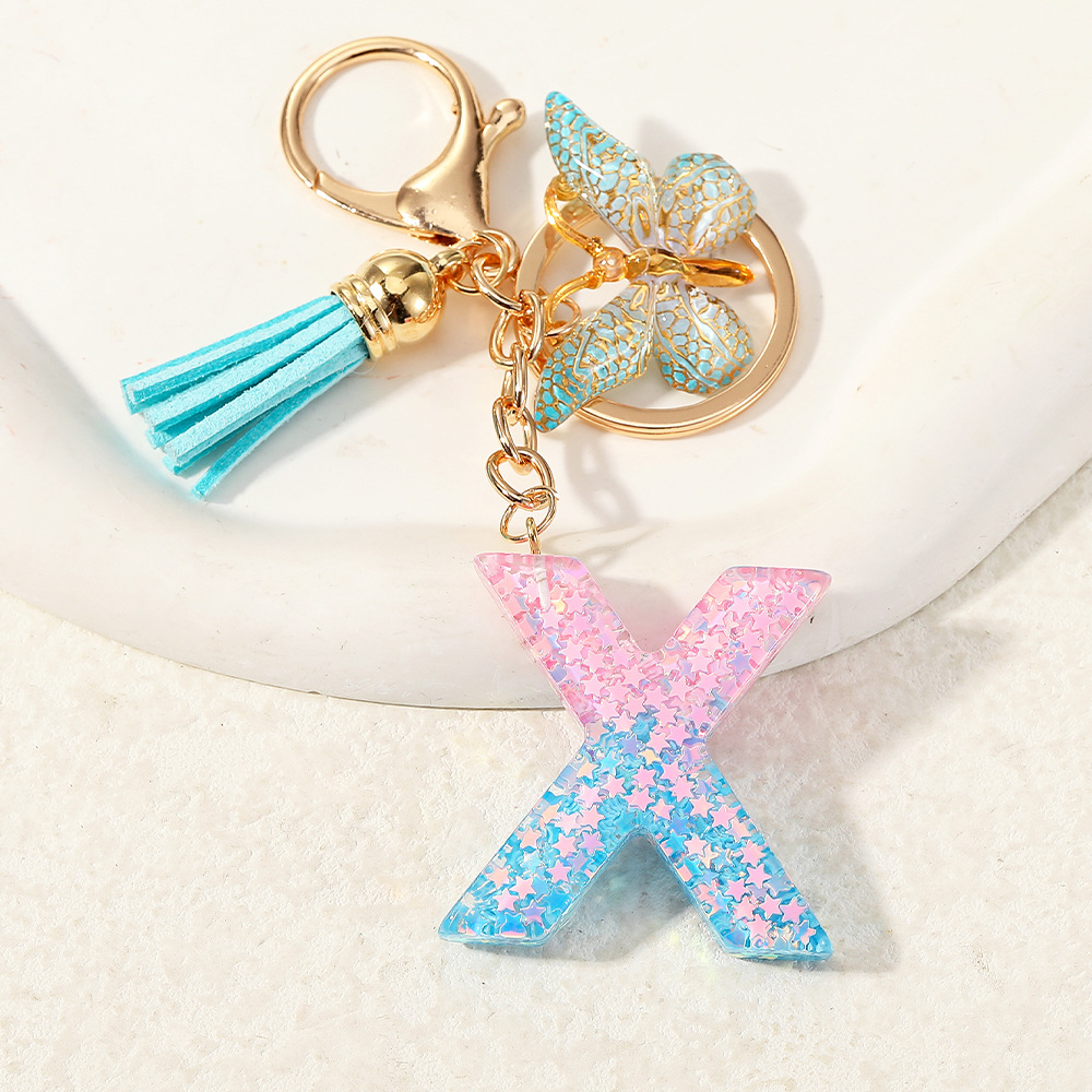 Europa y los Estados Unidos transfronterizos nuevos cristal sequinado goteo de goma letras inglesas joyería llavero y bolsos colgante apoyo al por mayor