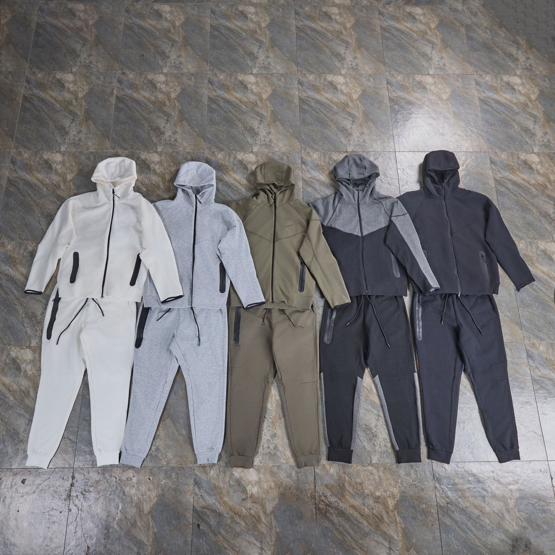 Sports suit capa de aire algodón traje deportivo hombre manga larga con capucha chaqueta de color a juego pantalones con cremallera de goma