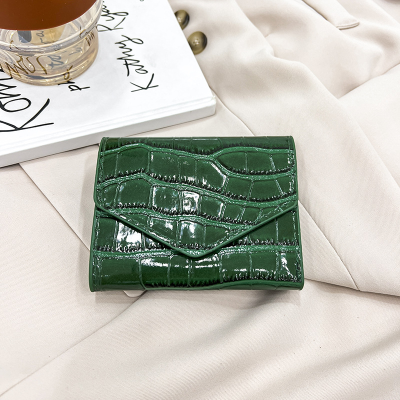 Personalidad textura casual tendencia simple bolsas de cena de color sólido de mujeres lápiz labial de moda de color sólido impresión bolsa de mano universal