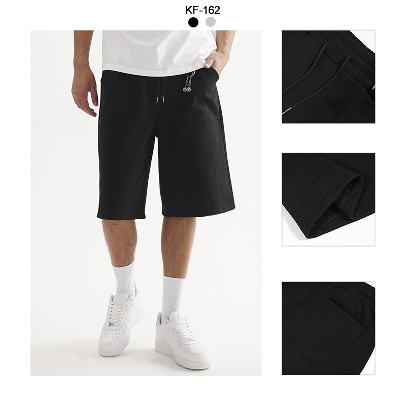 Pantalones cortos casuales de rodilla de alta calidad, pantalones cortos de hombre sueltos, pantalones de moda juveniles de siete puntos.