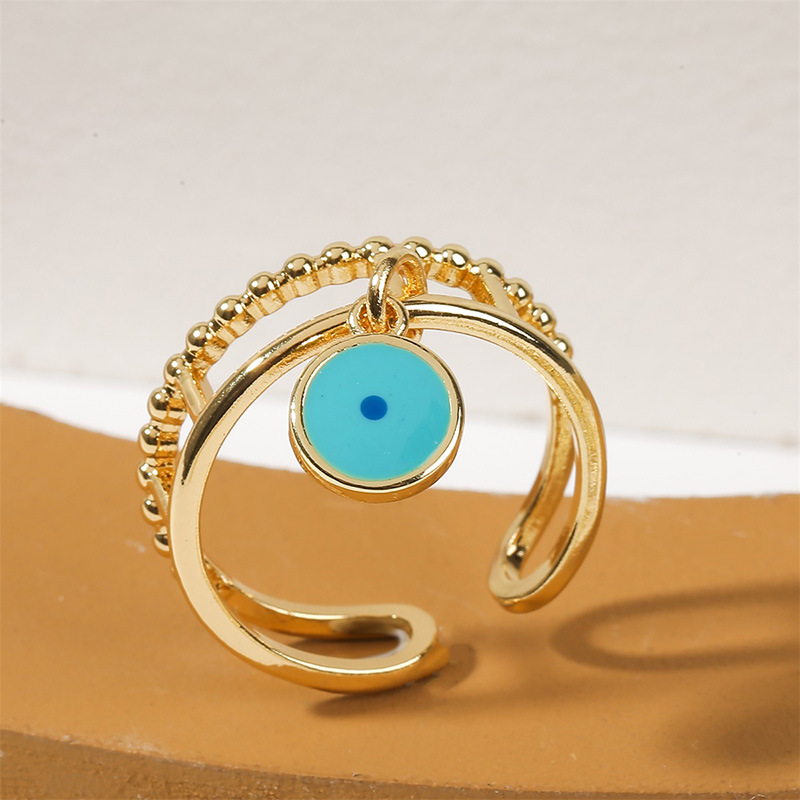 Fashion Simple Exquisite Dripping Oil Eyes Real Gold Electroplating Color Retention Adjustable Copper Ring display picture 1