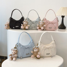 韩国可爱少女腋下包2025新款卡通公仔蝴蝶结单肩包磨砂休闲新月包