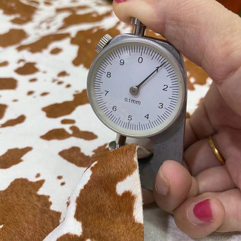 Factory wholesale small cow flower background color optional fur one bag fabric horse leather cow fur Factory wholesale small cow flower background color optional fur one bag fabric horse leather cow fur