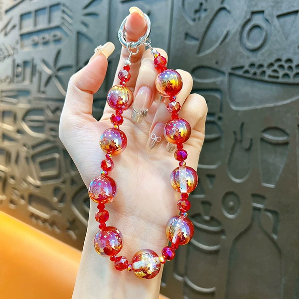 Red starry sky, beaded bracelet, mobile phone, gradient