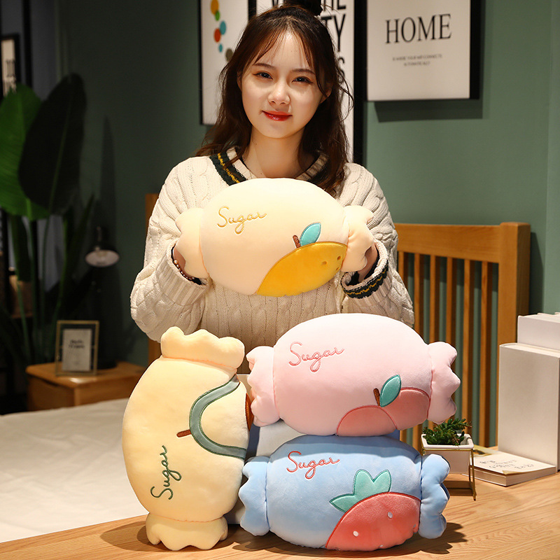 糖果暖手抱枕插手手枕冬天毛绒玩具暖手捂午睡枕学生活动礼品批发