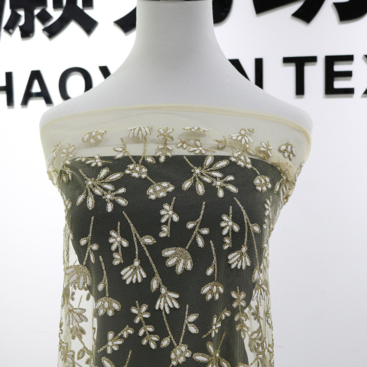 Después del proceso de tela de malla poliéster todo hilo de malla pulverizado tela de oro primavera y verano vestido de boda vestido de princesa tela