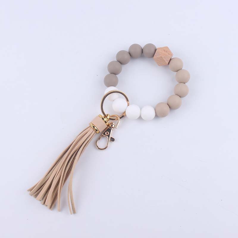 Pulsera de silicona pulsera llavero nuevo creativo DIY borla colgante contraste color