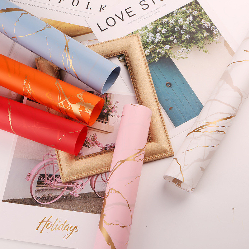 Fábrica de fiestas de flores al por mayor de mármol flor de papel de embalaje ramo de moda flor de papel de embalaje florista suministros