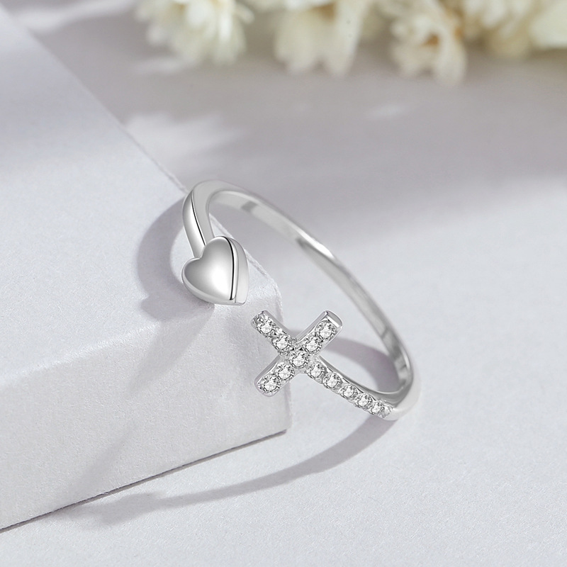 Anillo de amor cruzado europeo y americano Anillo abierto de diseño de nicho femenino Anillo de corazón de plata de ley 925 al por mayor