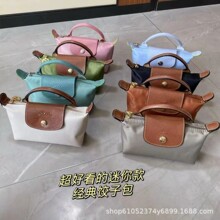 龙骧mini饺子包2024法式新款尼龙拼头层牛皮化妆包斜跨手拎包