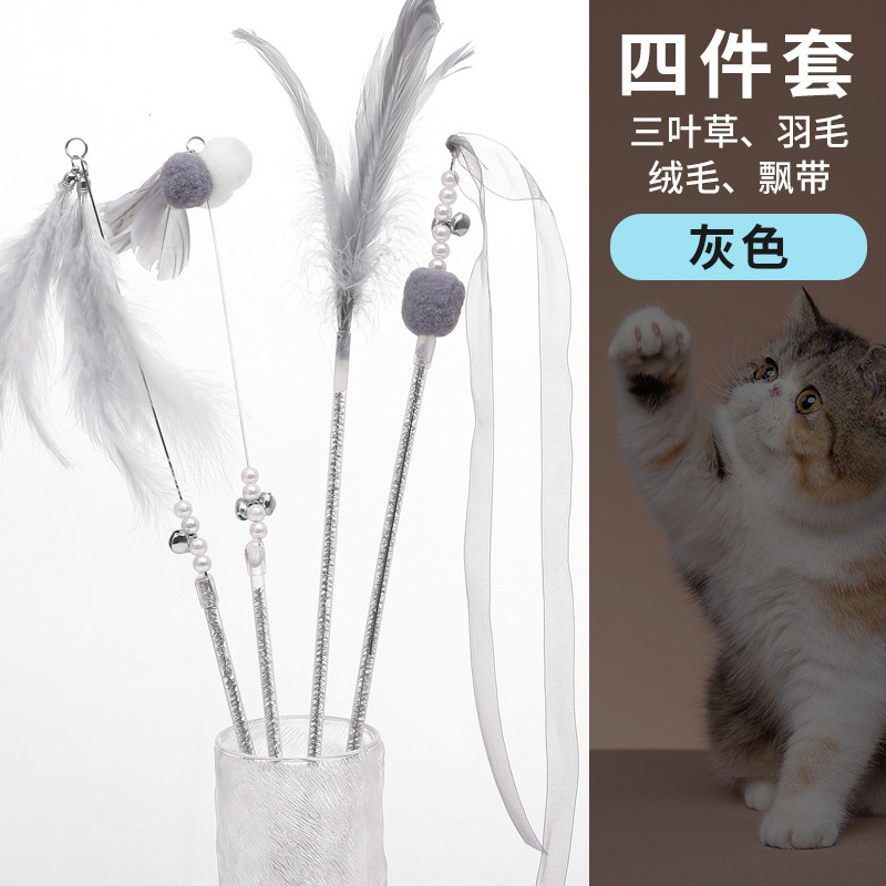 国境を越えた新しい猫のおもちゃ、猫の面白いスティック、妖精のスティック、自己刺激ベル、羽の長いポール、噛みつきにくいペット用品卸売