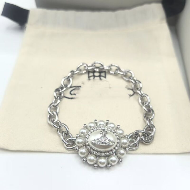 Little Red Book's Popular Empress Vivian Sunflower Pearl Magnetic Saturn Retro French Bracelet Factory Direct Sales Little Red Book's Popular Empress Vivian Sunflower Pearl Magnetic Saturn Retro French Bracelet Factory Direct Sales