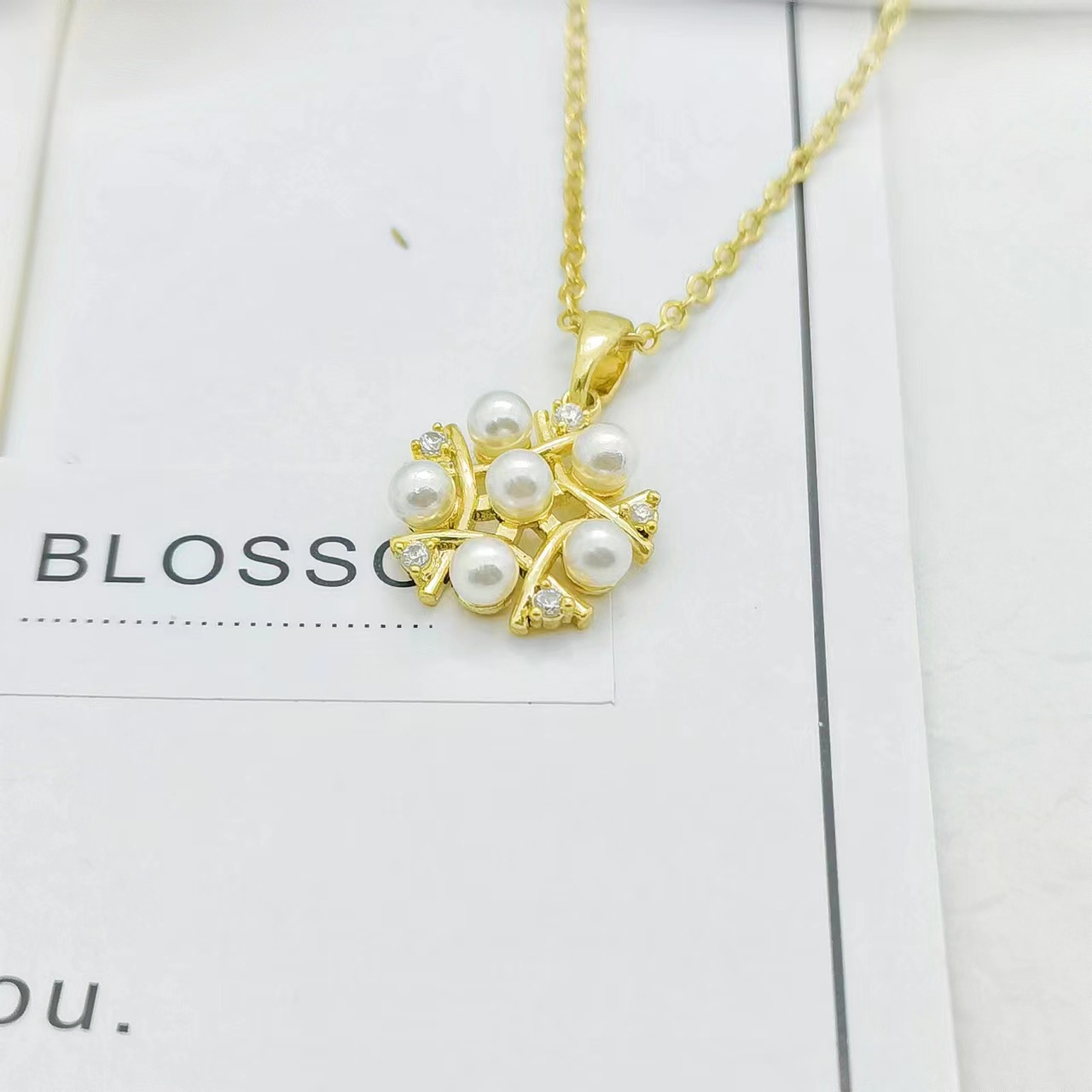 Ig Style Bamboo Flower Fish Tail Titanium Steel 18k Gold Plated Pearl Zircon Pendant Necklace In Bulk display picture 2