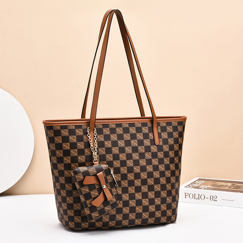 Bolso para mujeres 2025 nueva impresión de moda de gran capacidad bolso de hombro bolso de viaje con bolso de cambio bolso de gran tamaño