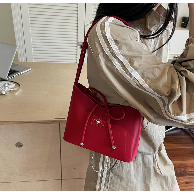 Women's fashion bucket bag 2025 new retro handbag, bow single-shoulder bag, solid color versatile underarm bag undefined