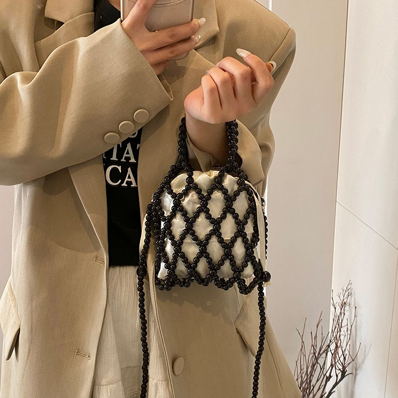 Bolso de moda coreano 2025 primavera y verano nuevo bolso femenino diseño de nicho bolso de hombro estilo occidental bolso de mensajero con cuentas marea