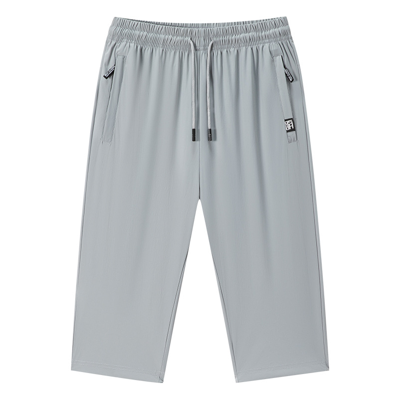 Pantalones casuales de nuevo estilo, pantalones de seda de hielo para hombres, pantalones con aire acondicionado para hombres, deportes transpirables, pantalones cortos de ocio, trajes de alta calidad